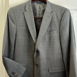 Tommy Hilfiger Suit- Coat/Blazer is a L and pants are 34/30.
